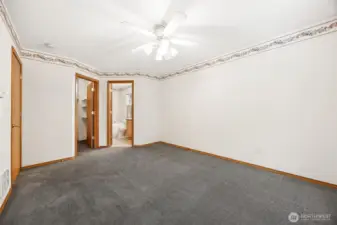 Primary bedroom on the Main floor with walk-in closet and ensuite with jetted tub.