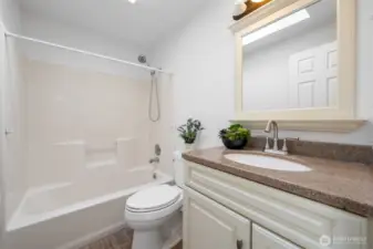 Full bathroom with skylight.