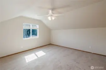 One of two large bedrooms on the top floor.