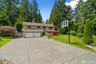 Welcome to this beautifully updated home in Education Hill, ideally situated at the end of a quiet cul-de-sac and backing onto a serene greenbelt. A new expansive driveway provides expansive parking options.