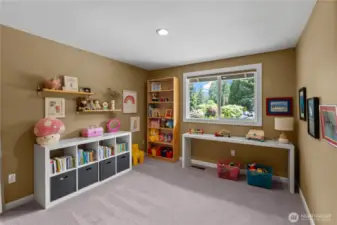 Whether utilized as a bedroom, toy or craft room, this newly carpeted space offers flexibility.