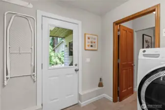 Steps from the laundry and bathroom is a covered patio where you can enjoy the hot tub year round.