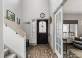 Removal of the closet opened the space creating a more inviting entryway.
