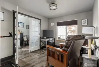 The great thing? French doors and a door on the opposing side of the room, create a quiet place to dine, work, or relax.
