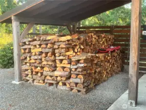 Several cords of wood are included.