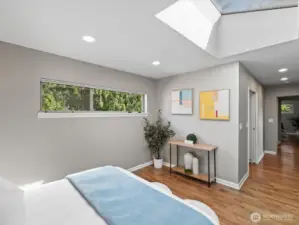 Primary bedroom with hallway to walk in closet