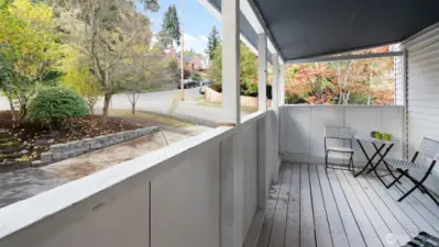 At the other end of the house, this covered porch beckons you to slow down and stay awhile. Morning coffee, evening tea, or anything in between—it’s the kind of spot that makes every day feel a little more peaceful.