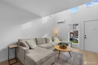 Oak hardwood floors throughout the expansive living & dining.