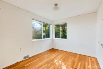 Bedroom 2 on the main floor. SW corner. Peekaboo views of Mt. Rainier from this room.