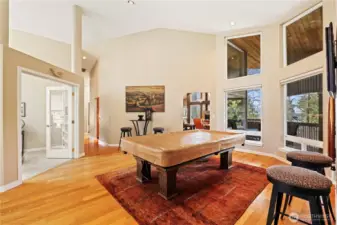 The high ceilings in the entry area/living room emphasize the stately nature of the home.