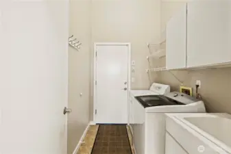 The oversized laundry room leads into the garage and has ample storage so it can be used as a mud room - a necessity for the Northwest.