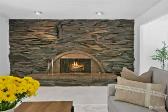 This home offers so many timeless features including this gorgeous stone wall surrounding the fireplace.