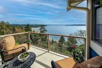 Upper deck off the primary bedroom. Large enough for two chairs and a table with views that see as fare as the eye can see.