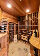 Wine cellar by APEX systems.  Whisper Cooler for climate control with slate floors. Wine cellar holds approximately 650 bottles.