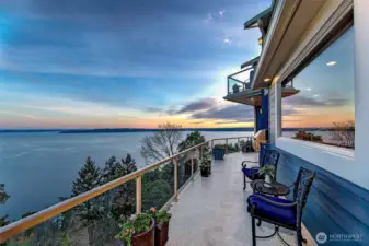 The deck spans the full length of the home.