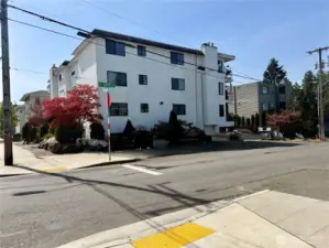 Guest parking located on the north side of building as well as street parking available