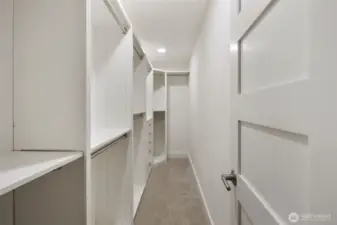 Spacious, finished walk-in closet off main bedroom