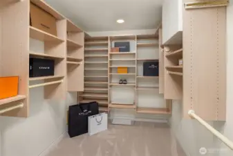 Imelda Marcos look out! Well-planned walk-in closets are hard to come by and this one is fabulous!