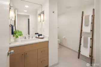 Fully remodeling bathroom boasts a big walk-in shower around the corner!