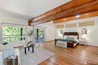 The owner's suite is impressive with large sitting area, covered deck, walk-in closet & slate tiled bathroom.