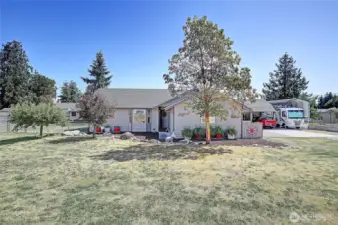 DOUBLE LOT! Charming and well-kept 1,297 sq ft rambler featuring 3 bedrooms and 1.75 baths—all on one level