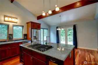 Island with propane stove and sink.