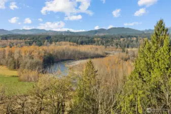 Stunning territorial views of mountains and river beyond!