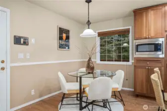 Cute breakfast nook has plenty of space, plus there is seating at the kitchen island.