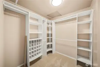 Custom walk in closet off primary en suite.