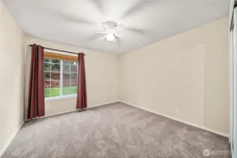 Upstairs bedroom #3 has a view of the beautiful surrounding forest.