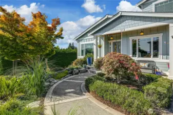 Water feature near the front door cascades to a koi pond.