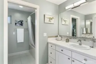 Dual sinks in the full bath.