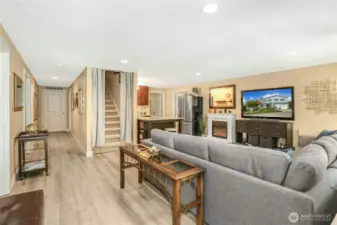 Lower level rec room or apartment (door can lock at top of stairs to the main floor).