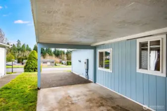Another view of the carport and driveway.
