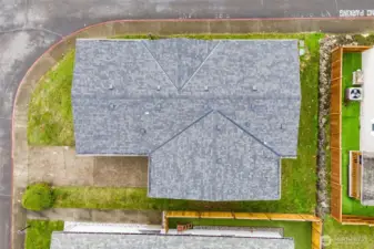 Aerial view showing the lot and brand new roof!