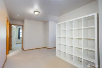 Loft area with storage shelves
