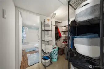 View showing the walk-in closet and attached bathroom.