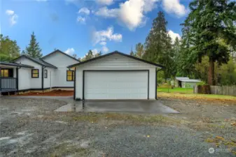 Detached two car garage is perfect bonus space.