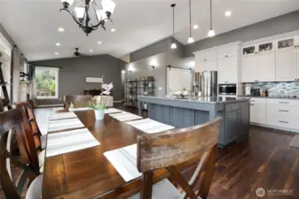 View from the corner of the dining area looking into kitchen and living space.
