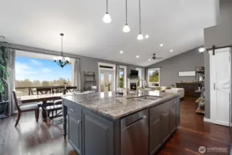 Look at the views form the kitchen. Doors open out to a huge deck for even more space.