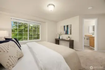 Primary bedroom with en-suite bathroom.