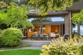 South-facing glass walls bring light and views to every room.