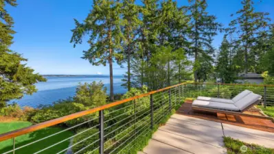 Rooftop garden patio with breathtaking sunrise views.
