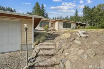 Single car Garage with large tool room in back.