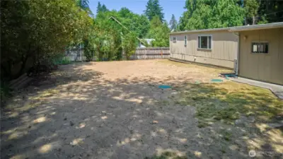 Excuse the dirt back yard--just had a brand new 3-bedroom drain field installed.