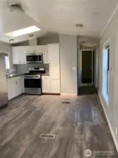 View from living into kitchen / down hall