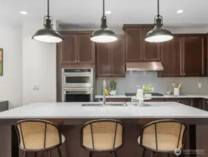 Large quartz island with space for seating.