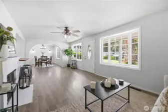 Light, bright, open concept living room, dining and kitchen