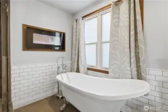 Soak in your clawfoot tub with your cozy fireplace and unwind after a long day