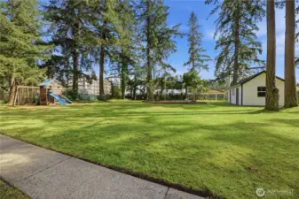 This amazing 27,000 sq foot yard is like your own private retreat